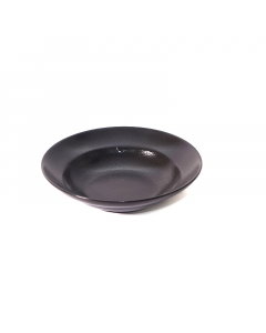 A deep black porcelain dish