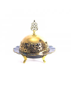A large date bowl with a golden and golden leg