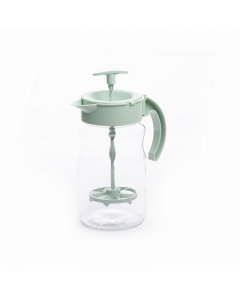 Glass jake with green plastic mixer